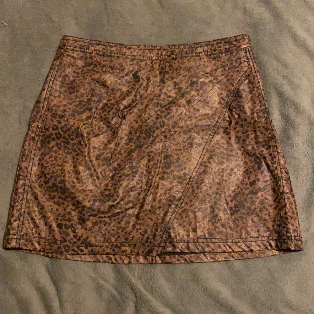 Free people faux leather skirt. Side zipper. Size small. Never worn